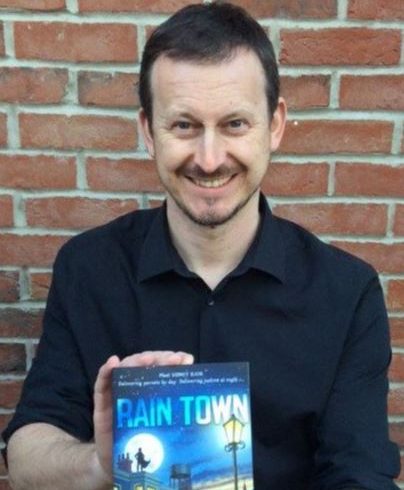 Mr Donaldson from Northampton High School presenting debut novel, Rain Town.