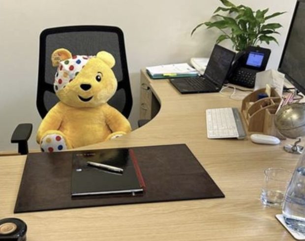 Children in Need mascot Pudsey Bear at Dr Lee's desk.