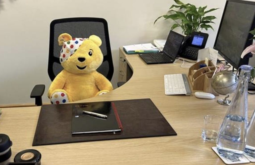 Children in Need mascot Pudsey Bear at Dr Lee's desk.